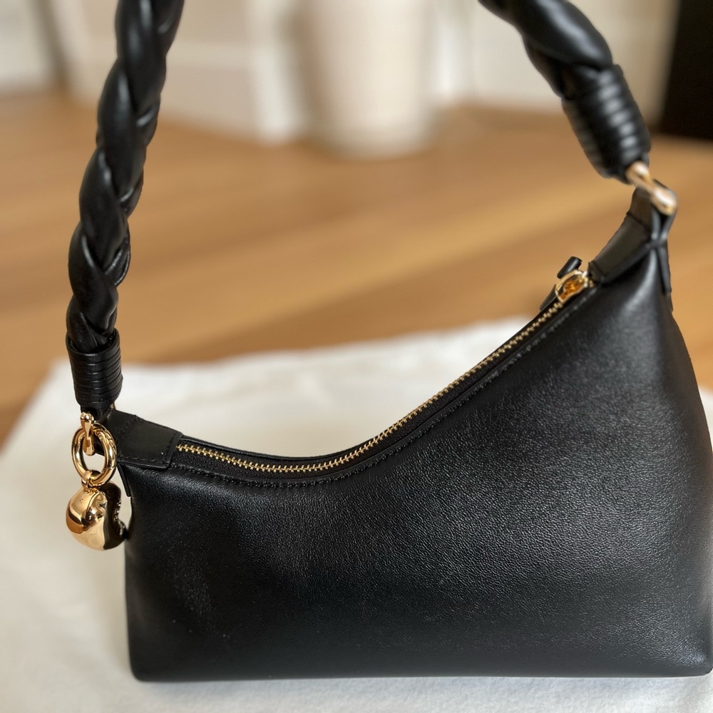 AUPEN
- Nirvana Black Leather Handbag with Gold Accents